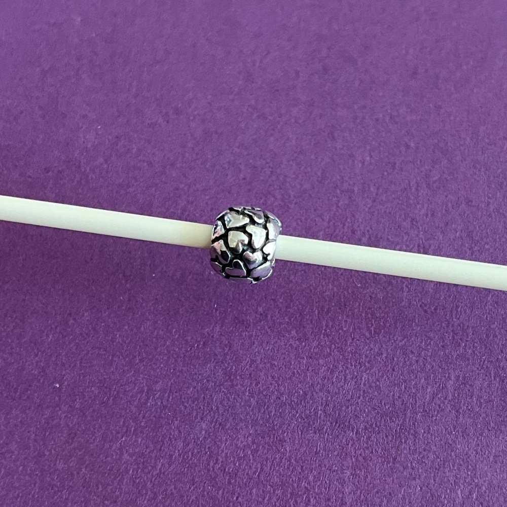 Pandora Retired Sterling Silver Lotsa Love hearts charm.